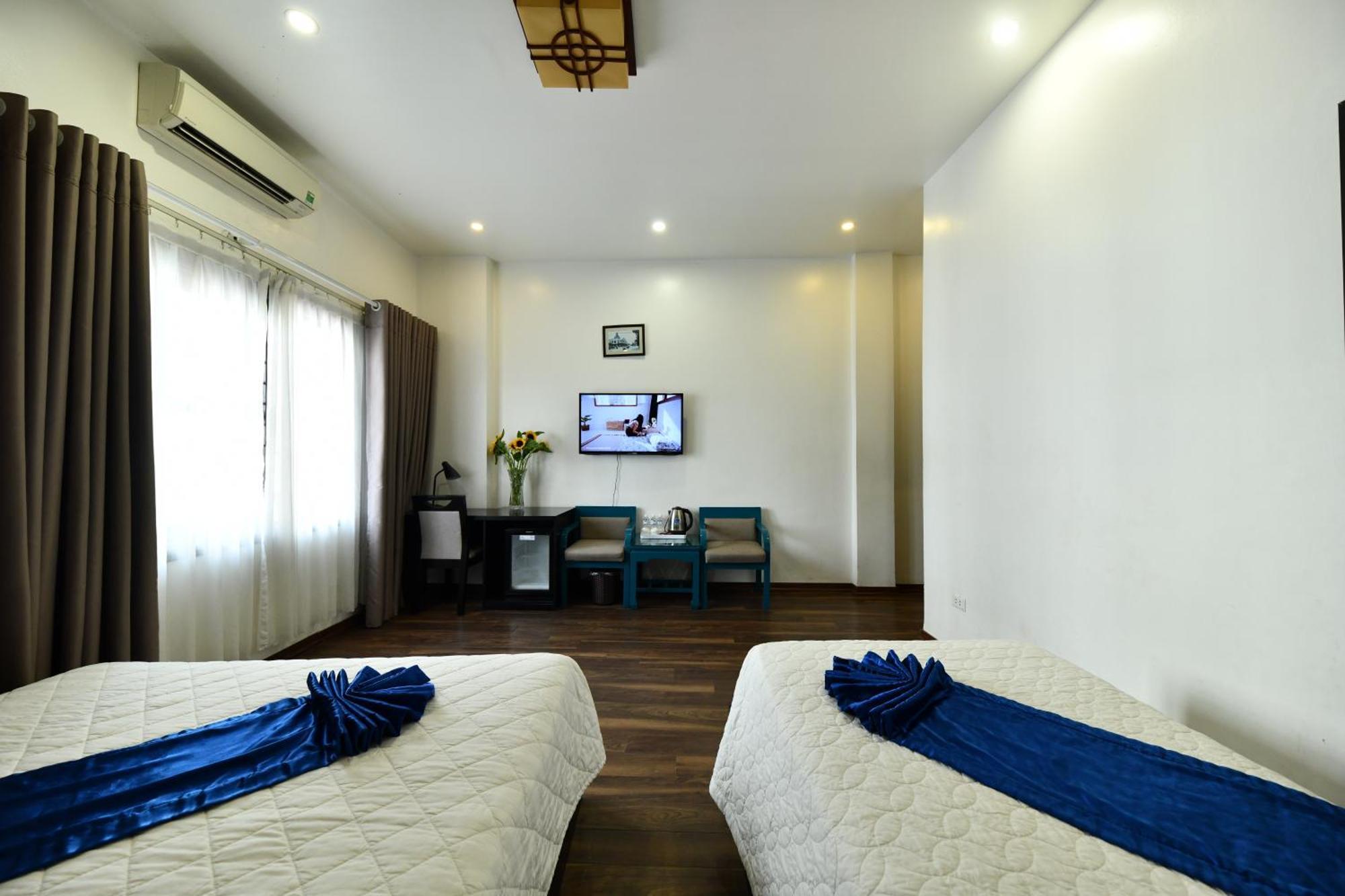 Deluxe Triple Room City View